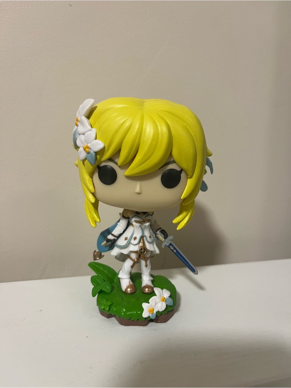 Funko Blonde Heroine Pop! Figure with White Outfit and Blue Sword